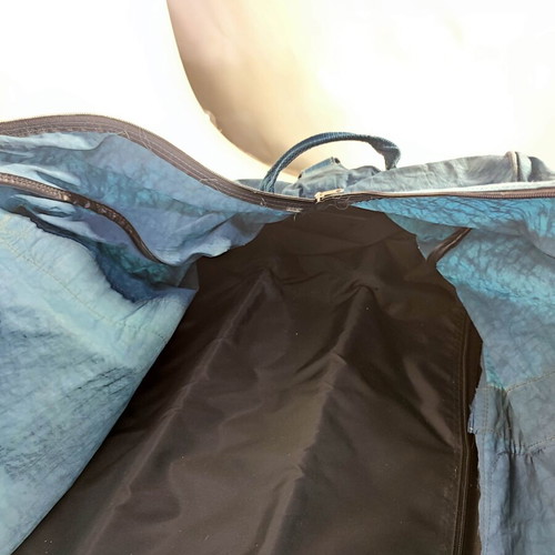 Large Enrico Benetti suitcase used with wheels and hard base blue