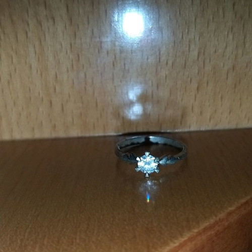 Silver solitaire ring