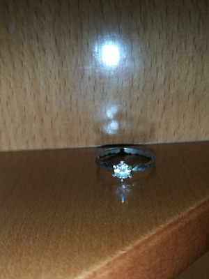 Silver solitaire ring