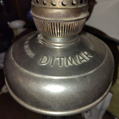 Lamp converted into adjustable light fixture
