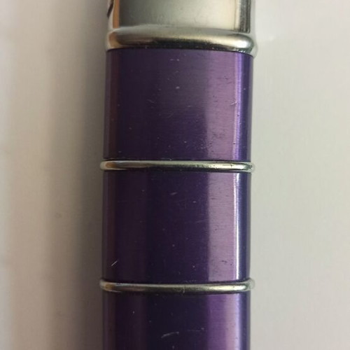 Metal lighter used, needs refilling