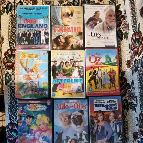 Collection of 10+ used movie DVDs with 3 sealed titles