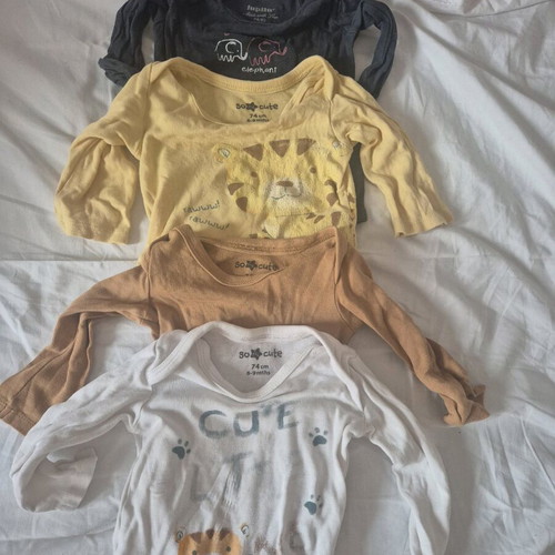 Set of 4 long-sleeve baby bodysuits used, 6-9 months
