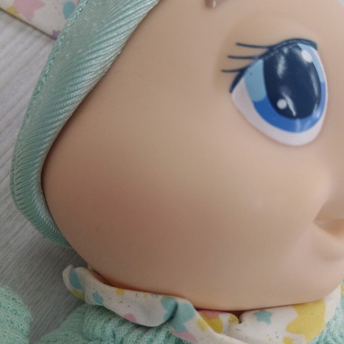 Light-up Huggy toy from the 1990s, fabric stains