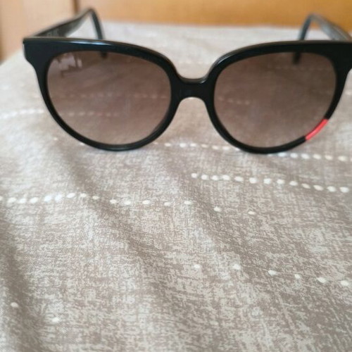 Sunglasses used, black and red