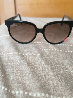 Sunglasses used, black and red