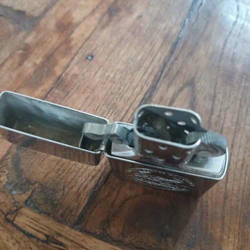 Zippo lighter used with embossed eagle emblem