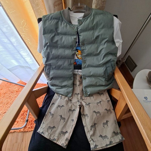 Package with 1 Zara vest 8-9 years, 1 new Orchestra shorts and 1 free t-shirt