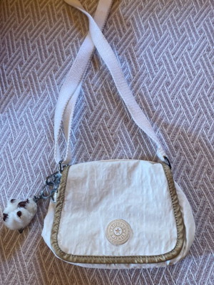 Kipling small crossbody bag used, beige with keychain