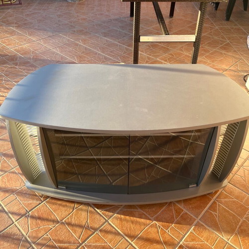 TV stand used with glass doors and rotating base