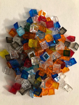 Package of 164 authentic LEGO Cheese Slopes transparent like new