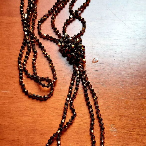 Lariat Necklace like new with brown crystal beads