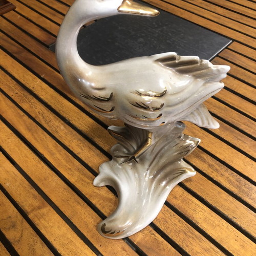 Antique ceramic bird statuette with gold leaf details, 40 years old