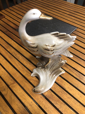 Antique ceramic bird statuette with gold leaf details, 40 years old