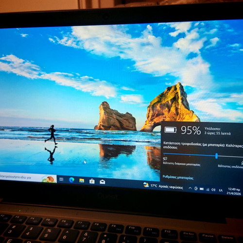 Quest Slimbook Plus 14.1" FHD laptop used with mouse and bag