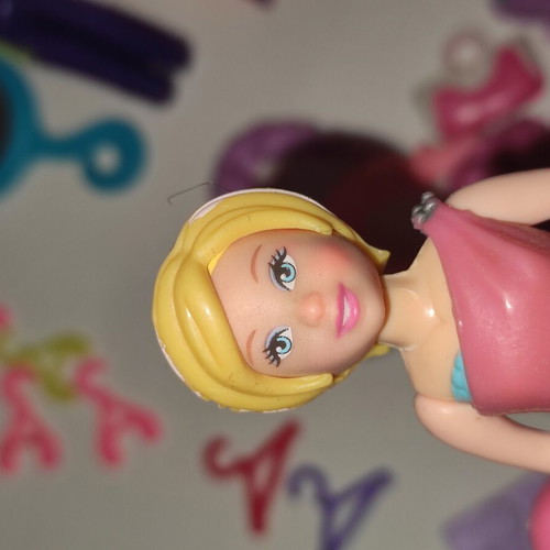 Polly Pocket bag with 9 dolls and accessories used