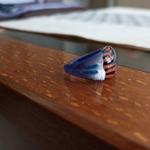 Murano ring like new with blue, orange and black colors and silver leaf