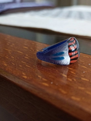 Murano ring like new with blue, orange and black colors and silver leaf