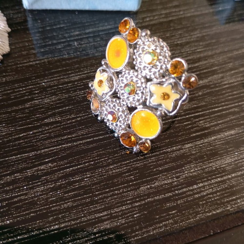 Adjustable ring like new, steel, yellow and orange