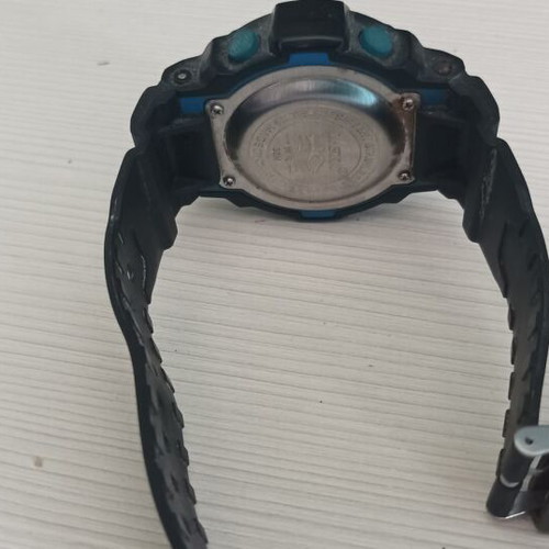 Electronic wristwatch used, battery replacement needed