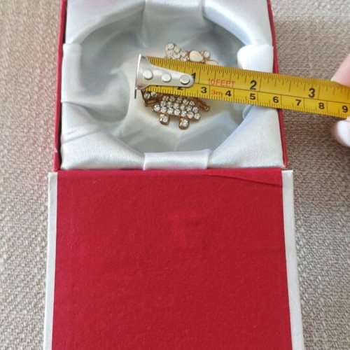 Hello Kitty pin new, gold color in box