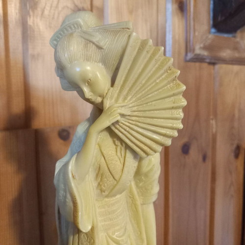 Samurai and Geisha vintage resin figurines in faux ivory