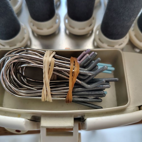 Vintage Heated Hair Rollers used for Long-Lasting Curls
