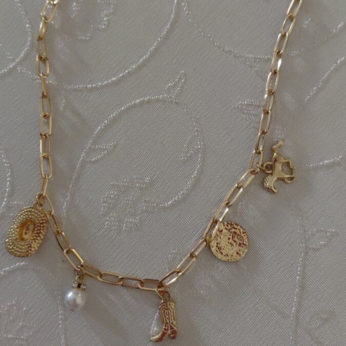 Faux Lucky Charm Necklace new, gold color