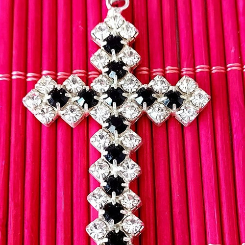 Cross used with white and black rhinestones