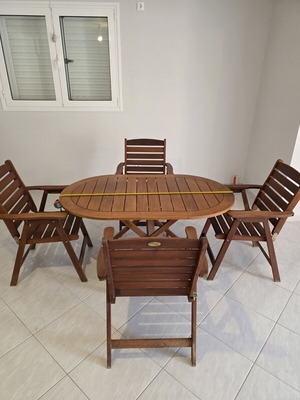 Garden table with 4 folding armchairs