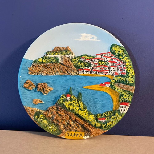 Embossed handmade decorative wall plate used with Parga depiction