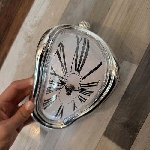 Decorative clock imitating melting clock