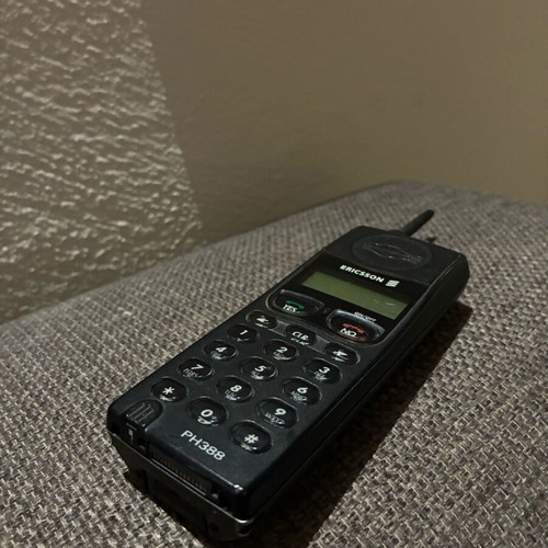 Ericsson 388 used, black, works with charger only