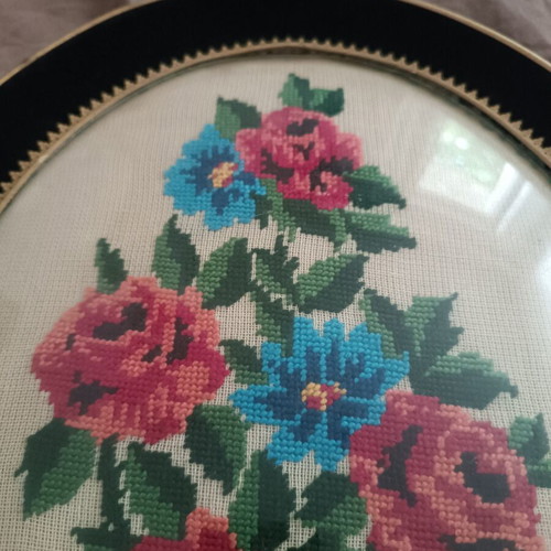 Vintage handmade cross-stitch frame with velvet oval border used