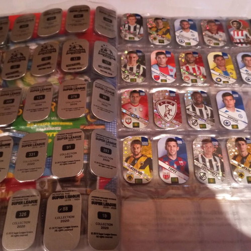 Super League collectible album with 44 metal tags used