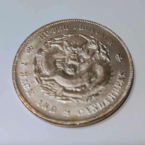 Decorative replica of Chinese coin Dragon Dollar used