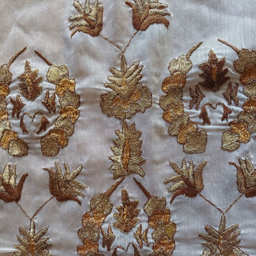 Embroidered table runner used with gold thread and lace