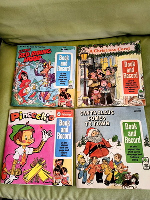 Collectible 45 RPM book and record discs like new, set of 4
