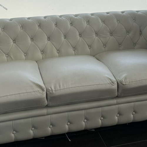 Leather three-seater sofa