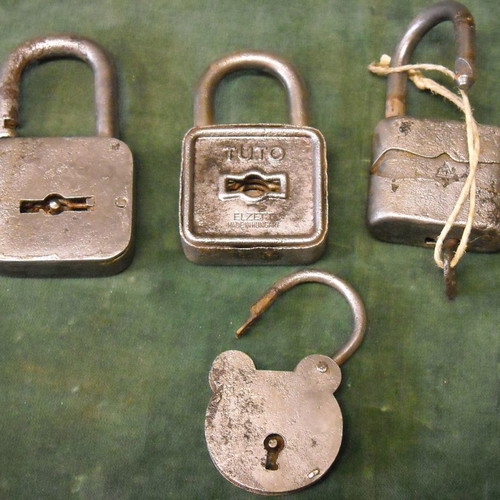 Collection of seven used old padlocks in various sizes