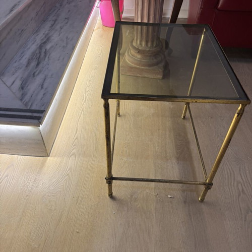 Midcentury metal coffee table with glass base used