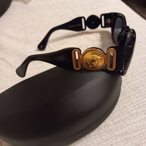 Versace sunglasses like new, vintage with gold decor