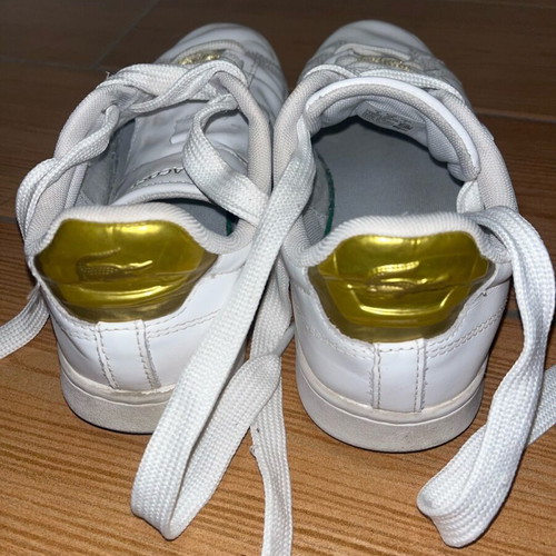 Lacoste sneakers used leather with gold details