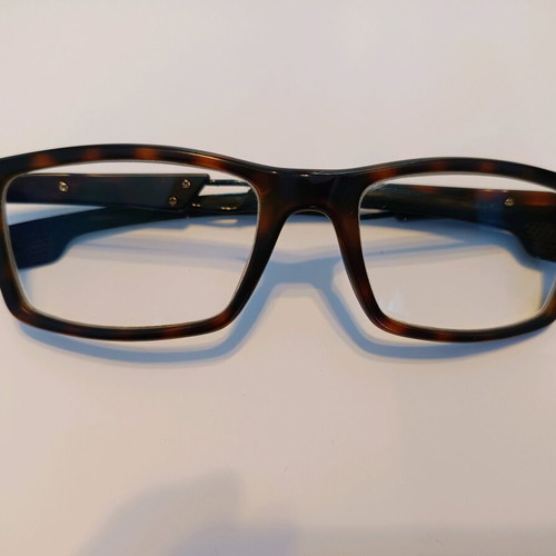 Carrera eyeglass frame used, black with light brown