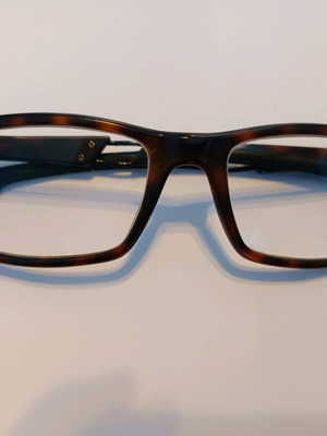 Carrera eyeglass frame used, black with light brown