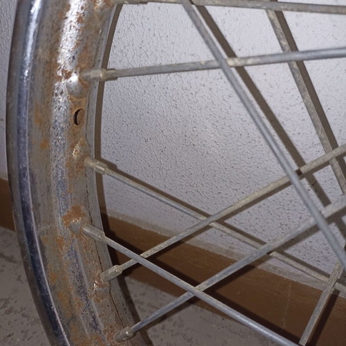 Motorcycle rim used, old with surface rust and missing spoke
