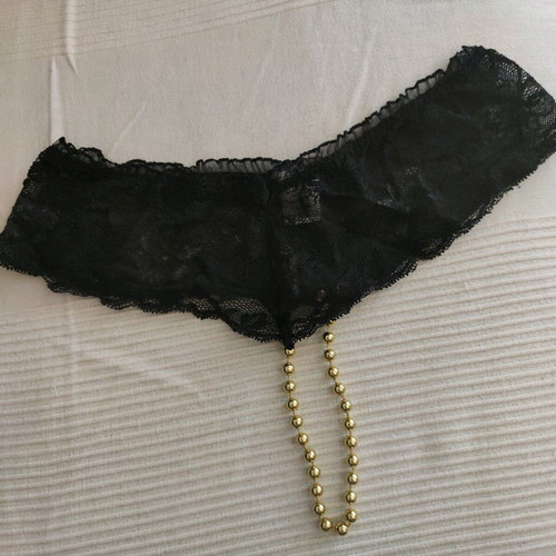String with lace and pearls new, black, fits medium and large