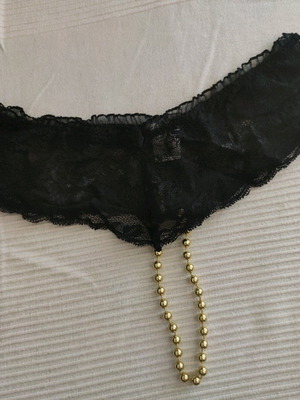 String with lace and pearls new, black, fits medium and large