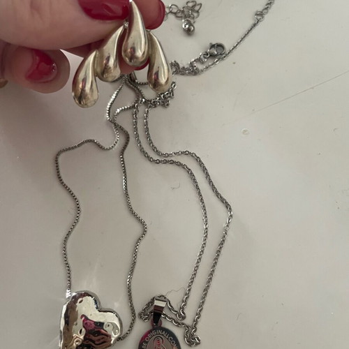 Jewelry set used with 2 necklaces and earrings