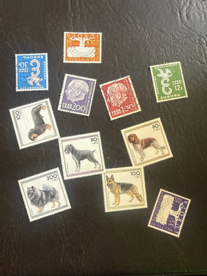 German Stamp Collection new, 11 collectible stamps Saarland & Dogs